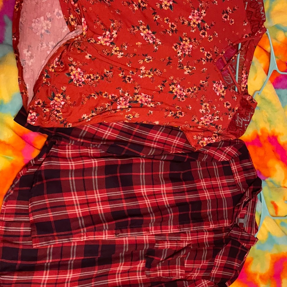 two women’s dress shirts worn 2 times